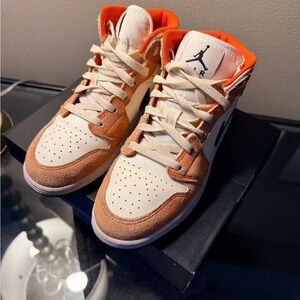 Jordan Mid SE in Team Orange, Black, and White